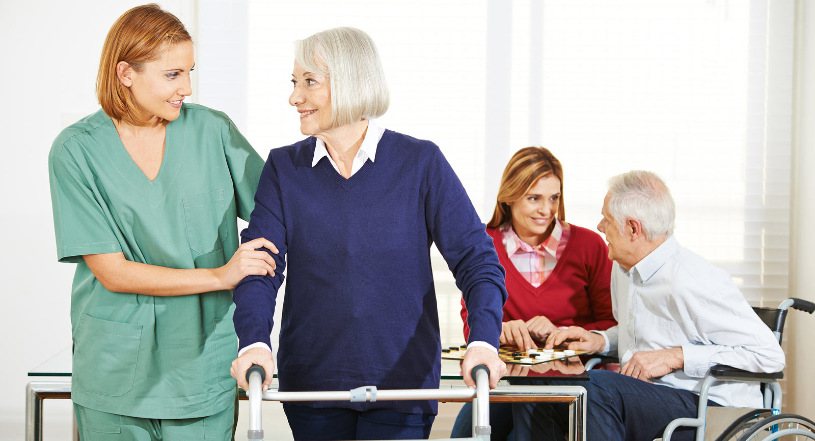 Family caregiver helping an older adult with daily activities